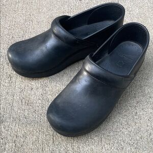 Dansko Black Leather Slip-On Clogs